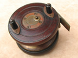 Early 20th century centrepin reel with brass starback & Slaters catch